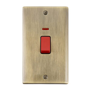 Saxby Raised Screwed 45A Large Plate DP Switch with Neon Antique Brass With Black Insert - RS555ABB